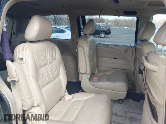 2006 Honda Odyssey EX-L z VIN 5FNRL387X6B055048, wystawiony jako IAAI lot #41974961 z przebiegiem 123 361 mil mil oraz . Historia ofert i sprzedaży dostępna na DreamBid. Obrazek 8.