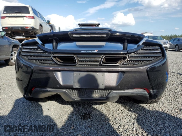 2015 McLaren 650S z VIN SBM11FAA3FW004388, wystawiony jako Copart lot #74802864 z przebiegiem Nie podano mil oraz Szkody całkowita. Historia ofert i sprzedaży dostępna na DreamBid. Obrazek 6.