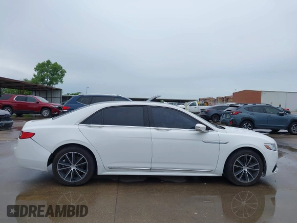 2017 Lincoln Continental Select z VIN 1LN6L9SK5H5616680, wystawiony jako IAAI lot #42465865 z przebiegiem 86 686 mil mil oraz . Historia ofert i sprzedaży dostępna na DreamBid. Obrazek 13.