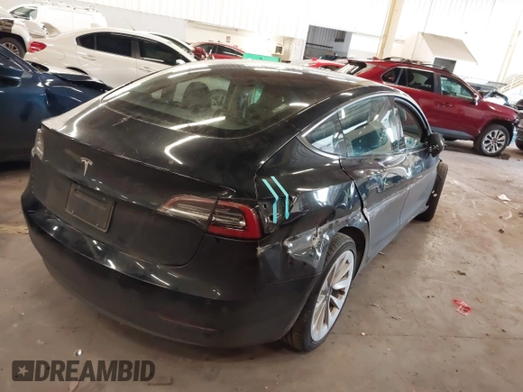 2022 Tesla Model 3 with VIN 5YJ3E1EA4NF187113, listed as a IAAI auction lot 41712331 with 81,879 mi miles and . Bid and sale history available at DreamBid. Image 4.