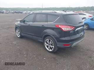 2015 Ford Escape Titanium z VIN 1FMCU0JX7FUB00462, wystawiony jako IAAI lot #42532943 z przebiegiem 88 623 mil mil oraz . Historia ofert i sprzedaży dostępna na DreamBid. Obrazek 3.