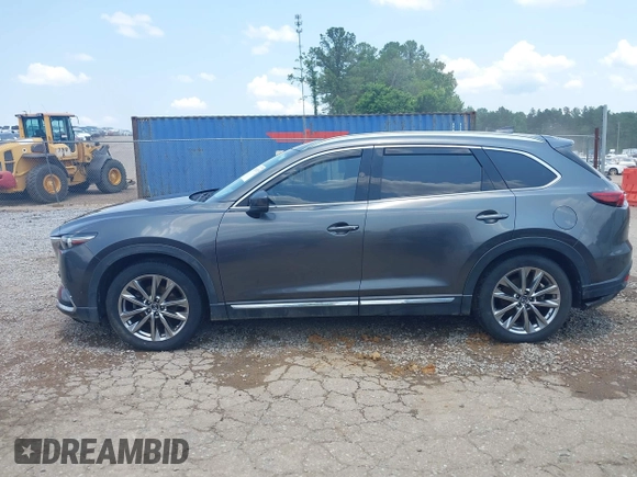 2018 Mazda CX-9 Grand Touring with VIN JM3TCADY7J0217595, listed as a IAAI auction lot 42381331 with 130,604 mi miles and . Bid and sale history available at DreamBid. Image 14.
