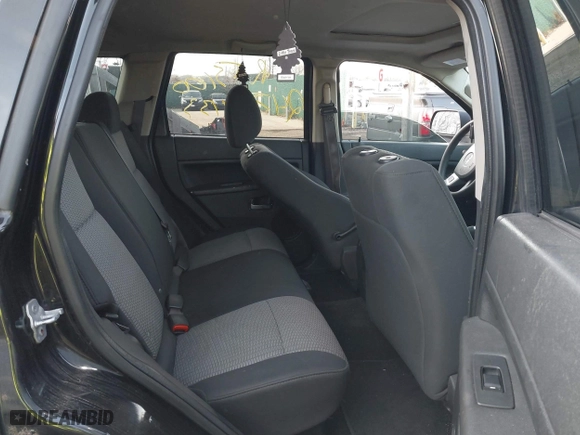 2009 Jeep Grand Cherokee Laredo with VIN 1J8GR48K29C552248, listed as a IAAI auction lot 41209184 with 194,778 mi miles. Bid and sale history available at carsss.com. Image 8.