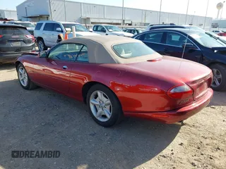 1997 Jaguar XK with VIN SAJGX2748VC011754, listed as a IAAI auction lot 41979459 with 34,601 mi miles and . Bid and sale history available at DreamBid. Image 3.
