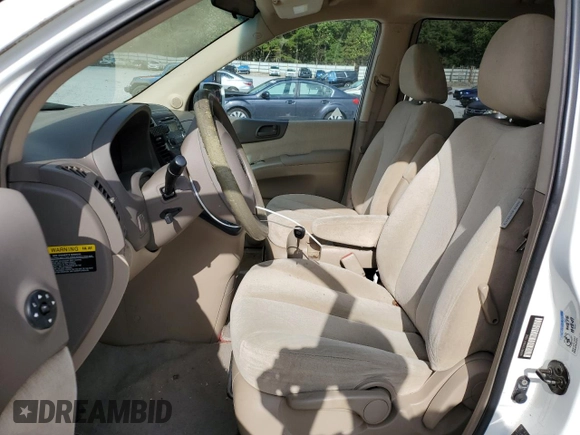 2006 Kia Sedona LX with VIN KNDMB233X66070866, listed as a Copart auction lot 71335794 with 242,416 mi miles and Salvage Title. Bid and sale history available at carsss.com. Image 7.