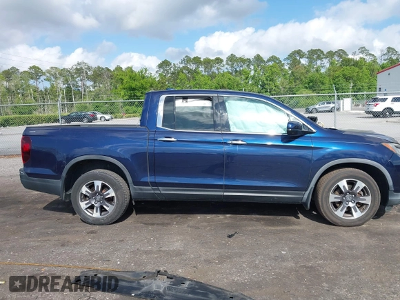 2019 Honda Ridgeline RTL-E with VIN 5FPYK3F76KB010613, listed as a IAAI auction lot 42079810 with 90,492 mi miles and . Bid and sale history available at DreamBid. Image 13.