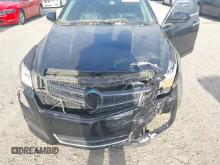 2014 Cadillac ATS Standard RWD z VIN 1G6AA5RA8E0167775, wystawiony jako IAAI lot #41972796 z przebiegiem 145 443 mil mil oraz . Historia ofert i sprzedaży dostępna na DreamBid. Obrazek 6.