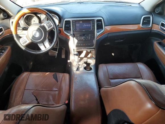 2013 Jeep Grand Cherokee Overland with VIN 1C4RJFCT8DC523252, listed as a Copart auction lot 48706965 with 173,325 mi miles and Salvage Title. Bid and sale history available at carsss.com. Image 8.