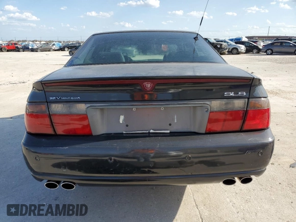 2002 Cadillac Seville Luxury SLS z VIN 1G6KS54YX2U154438, wystawiony jako Copart lot #67893314 z przebiegiem 115 313 mil mil oraz Szkody całkowita. Historia ofert i sprzedaży dostępna na DreamBid. Obrazek 6.