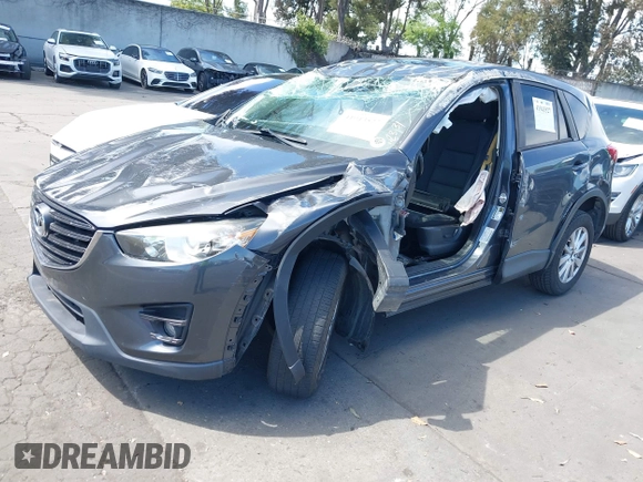 2016 Mazda CX-5 Touring with VIN JM3KE2CY6G0832967, listed as a IAAI auction lot 41943527 with 1 mi miles. Bid and sale history available at carsss.com. Image 22.