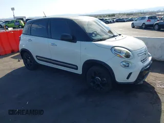 2015 FIAT 500L Urbana Trekking with VIN ZFBCFADH3FZ033034, listed as a IAAI auction lot 41906390 with 59,178 mi miles. Bid and sale history available at carsss.com. Image 1.