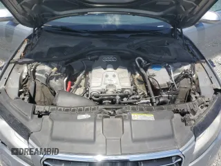 2014 Audi A7 Premium Plus z VIN WAUWGAFCXEN037853, wystawiony jako Copart lot #54741855 z przebiegiem 162 927 mil mil oraz Szkoda całkowita • Salvage title. Historia ofert i sprzedaży dostępna na DreamBid. Obrazek 11.
