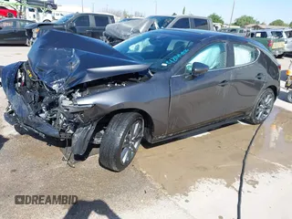 2023 Mazda 3 S Preferred with VIN JM1BPALM6P1610353, listed as a IAAI auction lot 42144106 with 55,131 mi miles and . Bid and sale history available at DreamBid. Image 2.