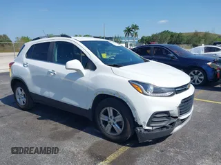 2018 Chevrolet Trax LT with VIN KL7CJLSB5JB591732, listed as a IAAI auction lot 42232548 with 153,859 mi miles and . Bid and sale history available at carsss.com. Image 1.