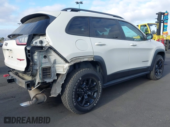 2019 Jeep Cherokee Trailhawk with VIN 1C4PJMBX0KD227083, listed as a IAAI auction lot 42120076 with 118,431 mi miles and . Bid and sale history available at DreamBid. Image 4.