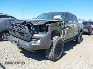 2017 Toyota Tacoma SR5 with VIN 5TFCZ5AN0HX073818, listed as a IAAI auction lot 41755546 with 129,861 mi miles and . Bid and sale history available at DreamBid. Image 2.