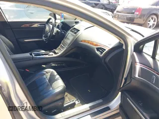 2015 Lincoln MKZ with VIN 3LN6L2J97FR608175, listed as a IAAI auction lot 41860094 with 196,965 mi miles and . Bid and sale history available at DreamBid. Image 5.