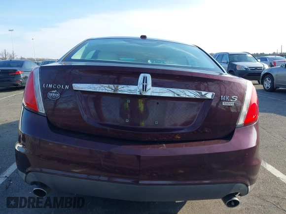 2011 Lincoln MKS z VIN 1LNHL9ERXBG603713, wystawiony jako IAAI lot #41215820 z przebiegiem 133 888 mil mil oraz . Historia ofert i sprzedaży dostępna na DreamBid. Obrazek 16.