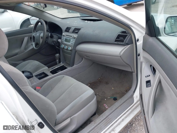 2007 Toyota Camry CE with VIN 4T1BE46KX7U664699, listed as a IAAI auction lot 42040572 with 201,624 mi miles. Bid and sale history available at carsss.com. Image 5.