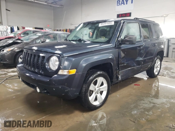 2014 Jeep Patriot Latitude with VIN 1C4NJRFB0ED588336, listed as a Copart auction lot 89391695 with 133,941 mi miles and Salvage Title. Bid and sale history available at carsss.com. Image 1.