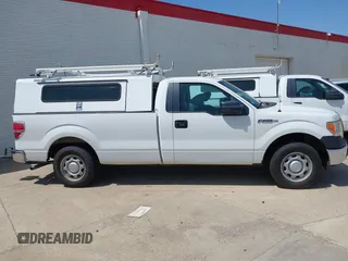 2012 Ford F-150 XL with VIN 1FTMF1CM7CKE24675, listed as a IAAI auction lot 41884476 with 127,455 mi miles. Bid and sale history available at carsss.com. Image 13.