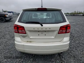 2015 Dodge Journey SE z VIN 3C4PDCABXFT595441, wystawiony jako Copart lot #59181825 z przebiegiem 122 263 mil mil oraz Szkoda całkowita • Salvage title. Historia ofert i sprzedaży dostępna na DreamBid. Obrazek 6.