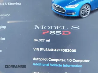 2015 Tesla Model S 85D with VIN 5YJSA4H47FF083005, listed as a IAAI auction lot 40970624 with 84,327 mi miles. Bid and sale history available at carsss.com. Image 16.