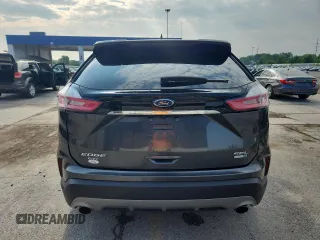 2020 Ford Edge SEL с VIN 2FMPK4J97LBA71577, выставлен на аукционе Copart как лот 60028525 с пробегом 66 365 миль миль и Списание • Salvage title. История ставок и продаж доступна на DreamBid. Изображение 6.