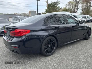 2018 BMW 5 Series M550i xDrive with VIN WBAJB9C57JB035521, listed as a Copart auction lot 54177125 with 63,924 mi miles and Clean Title. Bid and sale history available at carsss.com. Image 4.