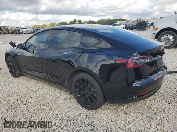 2022 Tesla Model 3 with VIN 5YJ3E1EA2NF124334, listed as a Copart auction lot 45390715 with 25,861 mi miles and Salvage Title. Bid and sale history available at carsss.com. Image 2.