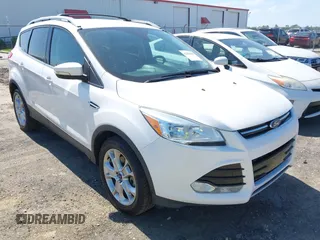 2016 Ford Escape Titanium with VIN 1FMCU9JX2GUC60514, listed as a IAAI auction lot 42466309 with 119,211 mi miles and . Bid and sale history available at DreamBid. Image 1.