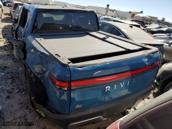 2022 Rivian R1T Adventure Package with VIN 7FCTGAAA4NN010881, listed as a Copart auction lot 58783584 with 0 mi miles and Salvage Title. Bid and sale history available at carsss.com. Image 6.