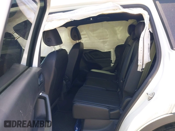 2022 Volkswagen Tiguan SE R-Line Black with VIN 3VVCB7AX3NM073218, listed as a IAAI auction lot 42254388 with 31,998 mi miles and . Bid and sale history available at DreamBid. Image 8.