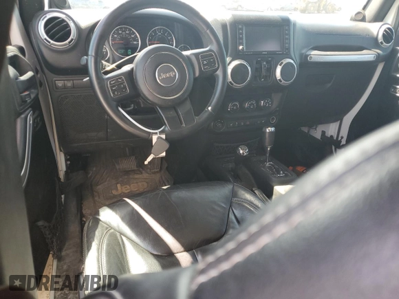 2013 Jeep Wrangler Unlimited Rubicon with VIN 1C4HJWFG2DL549064, listed as a Copart auction lot 56474055 with 148,217 mi miles and Salvage title. Bid and sale history available at DreamBid. Image 8.