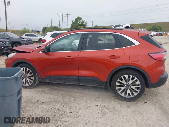 2020 Ford Escape Titanium Hybrid with VIN 1FMCU0DZ1LUB13684, listed as a IAAI auction lot 41629782 with 31,669 mi miles and . Bid and sale history available at DreamBid. Image 14.