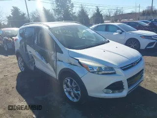 2016 Ford Escape Titanium with VIN 1FMCU9J96GUB65441, listed as a IAAI auction lot 41412223 with 74,218 mi miles. Bid and sale history available at carsss.com. Image 1.