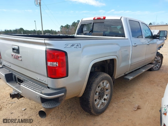 2017 GMC Sierra 2500HD Denali with VIN 1GT12UEY8HF216479, listed as a IAAI auction lot 41678315 with 127,057 mi miles. Bid and sale history available at carsss.com. Image 4.