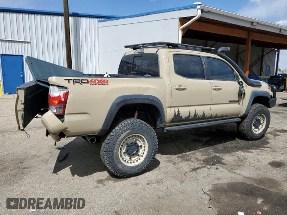 2017 Toyota Tacoma SR5 z VIN 3TMCZ5AN4HM082849, wystawiony jako Copart lot #54246425 z przebiegiem 49 163 mil mil oraz Szkoda całkowita • Salvage title. Historia ofert i sprzedaży dostępna na DreamBid. Obrazek 3.