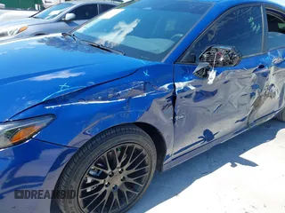 2025 Toyota Camry LE with VIN 4T1DAACK3SU104152, listed as a IAAI auction lot 42039337 with 1,423 mi miles and . Bid and sale history available at DreamBid. Image 17.