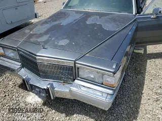 1991 Cadillac Brougham z VIN 1G6DW54E6MR718286, wystawiony jako Copart lot #54732145 z przebiegiem Nie podano mil oraz Tytuł czysty. Historia ofert i sprzedaży dostępna na DreamBid. Obrazek 11.