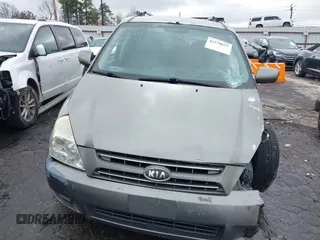 2010 Kia Sedona EX with VIN KNDMH4C33A6342127, listed as a IAAI auction lot 41570657 with 249,395 mi miles. Bid and sale history available at carsss.com. Image 12.