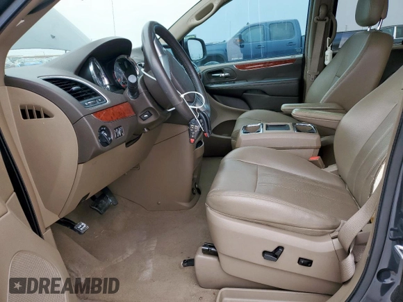 2013 Chrysler Town & Country Touring L with VIN 2C4RC1CG4DR734357, listed as a Copart auction lot 53528215 with 146,680 mi miles and Salvage Title. Bid and sale history available at DreamBid. Image 7.