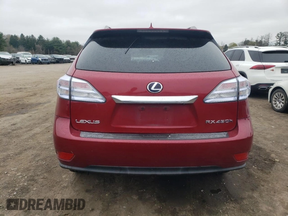 2010 Lexus RX 450h with VIN JTJBC1BAXA2007326, listed as a Copart auction lot 52575415 with 228,316 mi miles and Salvage Title. Bid and sale history available at DreamBid. Image 6.