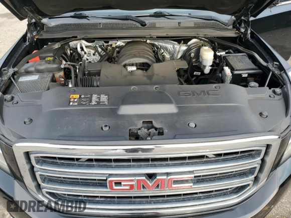 2016 GMC Yukon XL SLE with VIN 1GKS1FKCXGR479666, listed as a Copart auction lot 46640135 with 106,345 mi miles and Salvage Title. Bid and sale history available at carsss.com. Image 14.