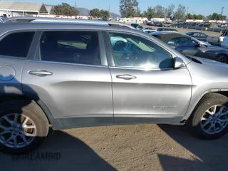 2016 Jeep Cherokee Latitude with VIN 1C4PJMCBXGW118161, listed as a IAAI auction lot 41686583 with 183,431 mi miles. Bid and sale history available at carsss.com. Image 13.