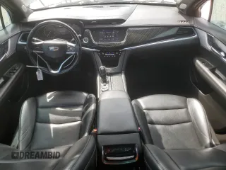 2023 Cadillac XT6 FWD Premium Luxury with VIN 1GYKPCRS6PZ127331, listed as a Copart auction lot 52951105 with 47,796 mi miles and Salvage Title. Bid and sale history available at carsss.com. Image 8.