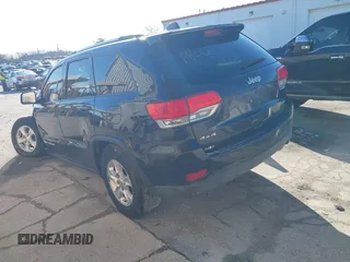 2016 Jeep Grand Cherokee Laredo z VIN 1C4RJFAG0GC425732, wystawiony jako IAAI lot #41641806 z przebiegiem 174 871 mil mil oraz . Historia ofert i sprzedaży dostępna na DreamBid. Obrazek 3.