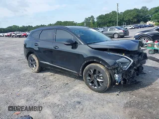 2023 Kia Sportage SX-Prestige z VIN KNDPXCAG1P7020251, wystawiony jako IAAI lot #42364221 z przebiegiem 129 885 mil mil oraz . Historia ofert i sprzedaży dostępna na DreamBid. Obrazek 1.