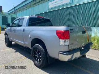 2010 Toyota Tundra with VIN 5TFUM5F11AX01281, listed as a Copart auction lot 66980935 with 308,906 mi miles and Clean title. Bid and sale history available at DreamBid. Image 3.