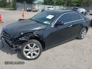 2014 Cadillac ATS Standard AWD z VIN 1G6AG5RX2E0119868, wystawiony jako IAAI lot #42095166 z przebiegiem 113 151 mil mil oraz . Historia ofert i sprzedaży dostępna na DreamBid. Obrazek 2.